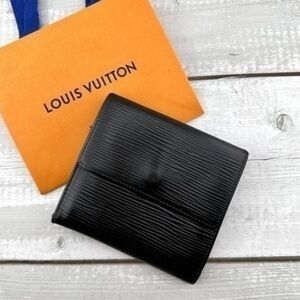 AUTHENTIC Louis Vuitton Marco Wallet. Color: Black